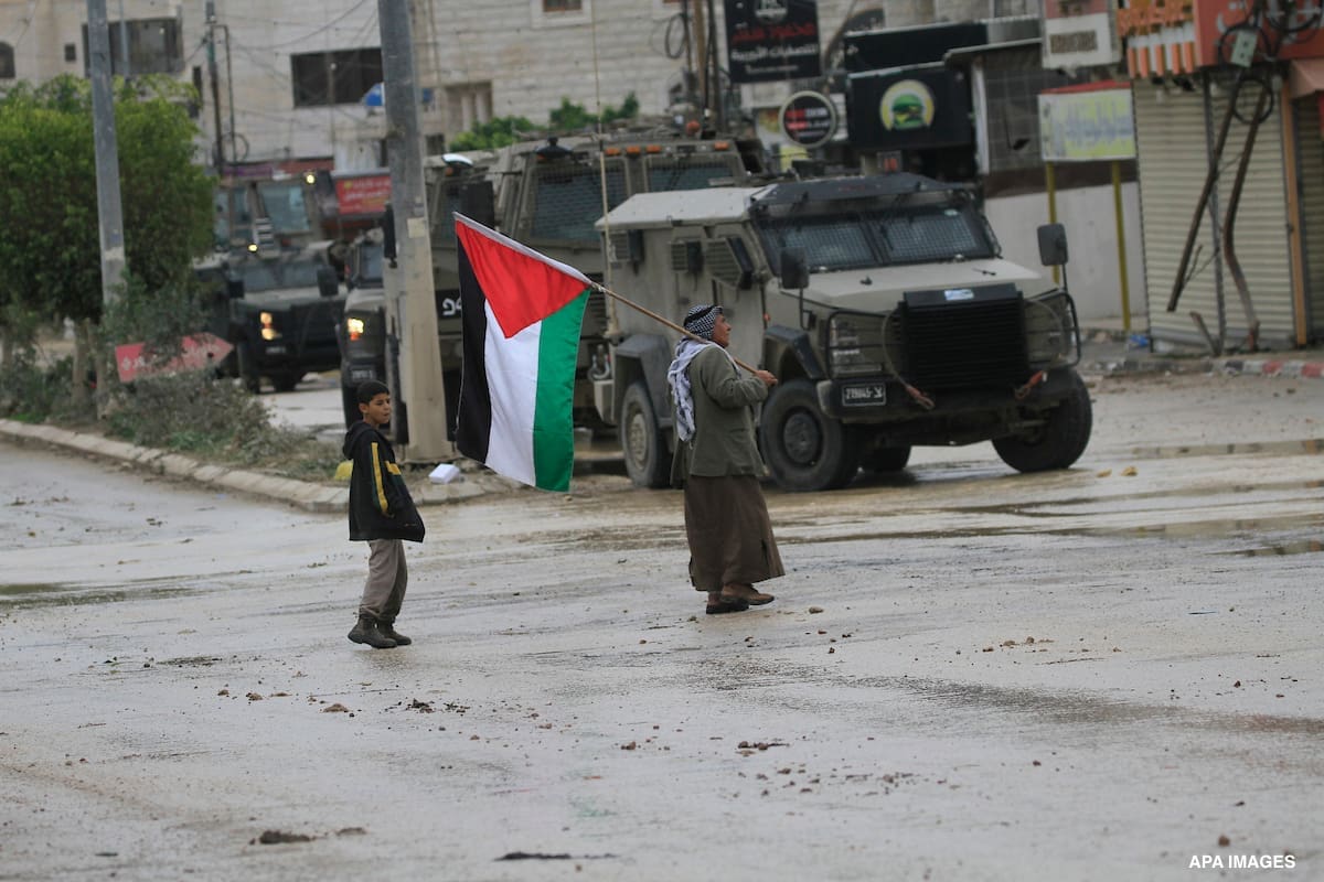 Israeli army forces are seen during a raid in the Tulkarm refugee camp in the West Bank city of Tulkarm